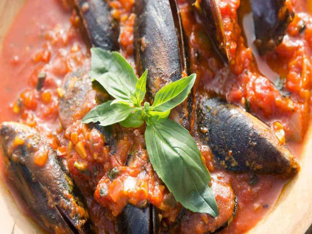 Mussels cooked in traditional buzara sauce