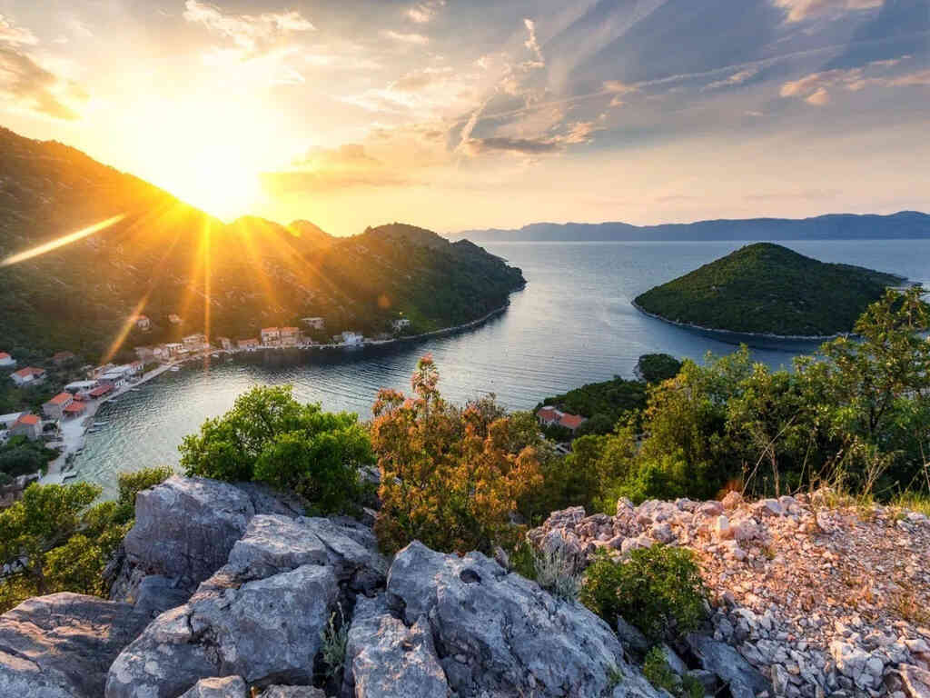 Forested shoreline and clear water in Mljet National Park